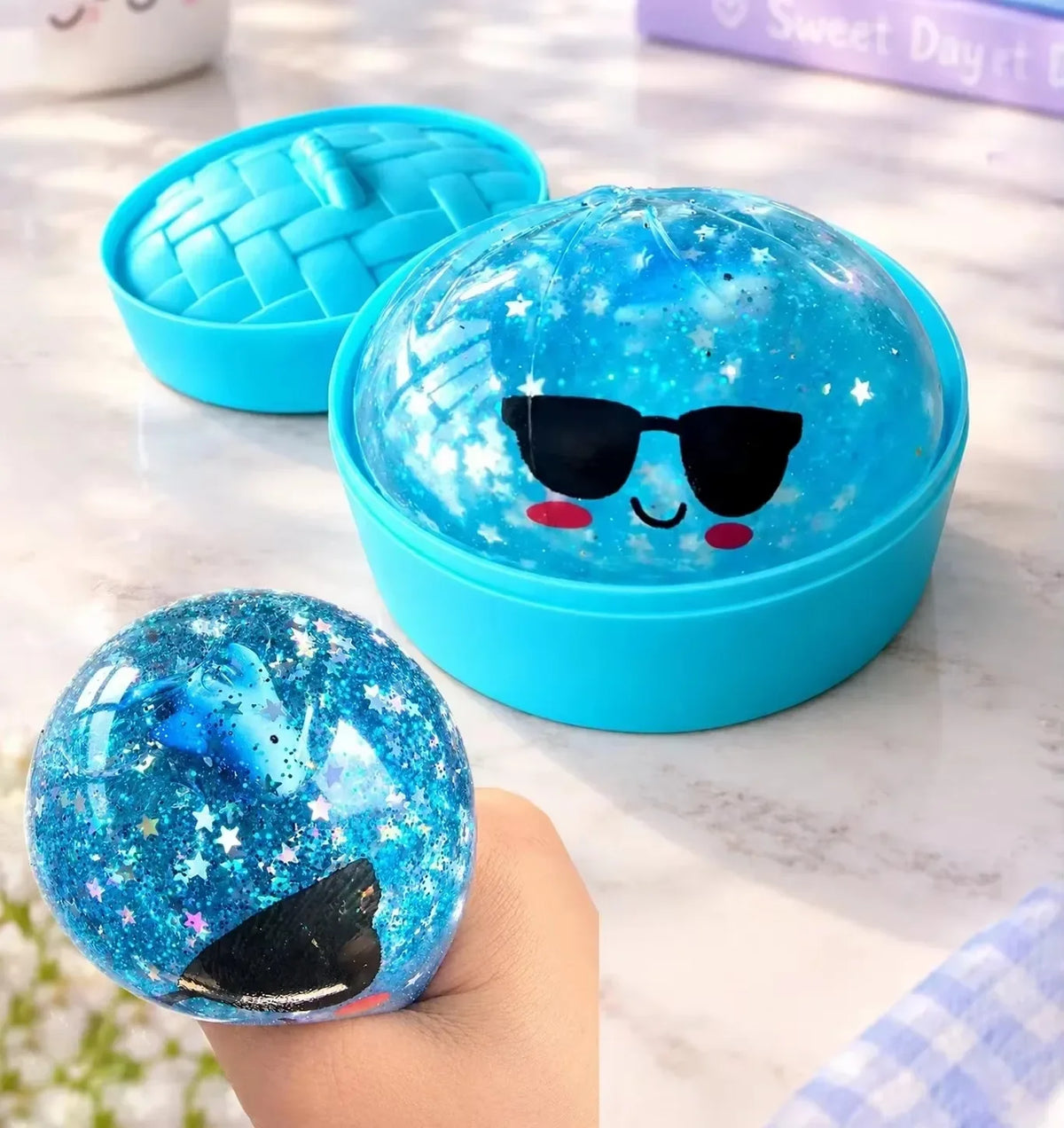 Squishy dumpling bleu à lunettes
