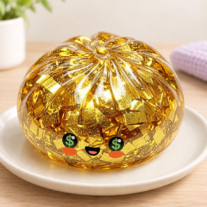 Squishy dumpling doré au visage dollar