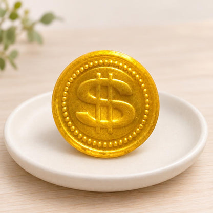 Squishy pièce dorée